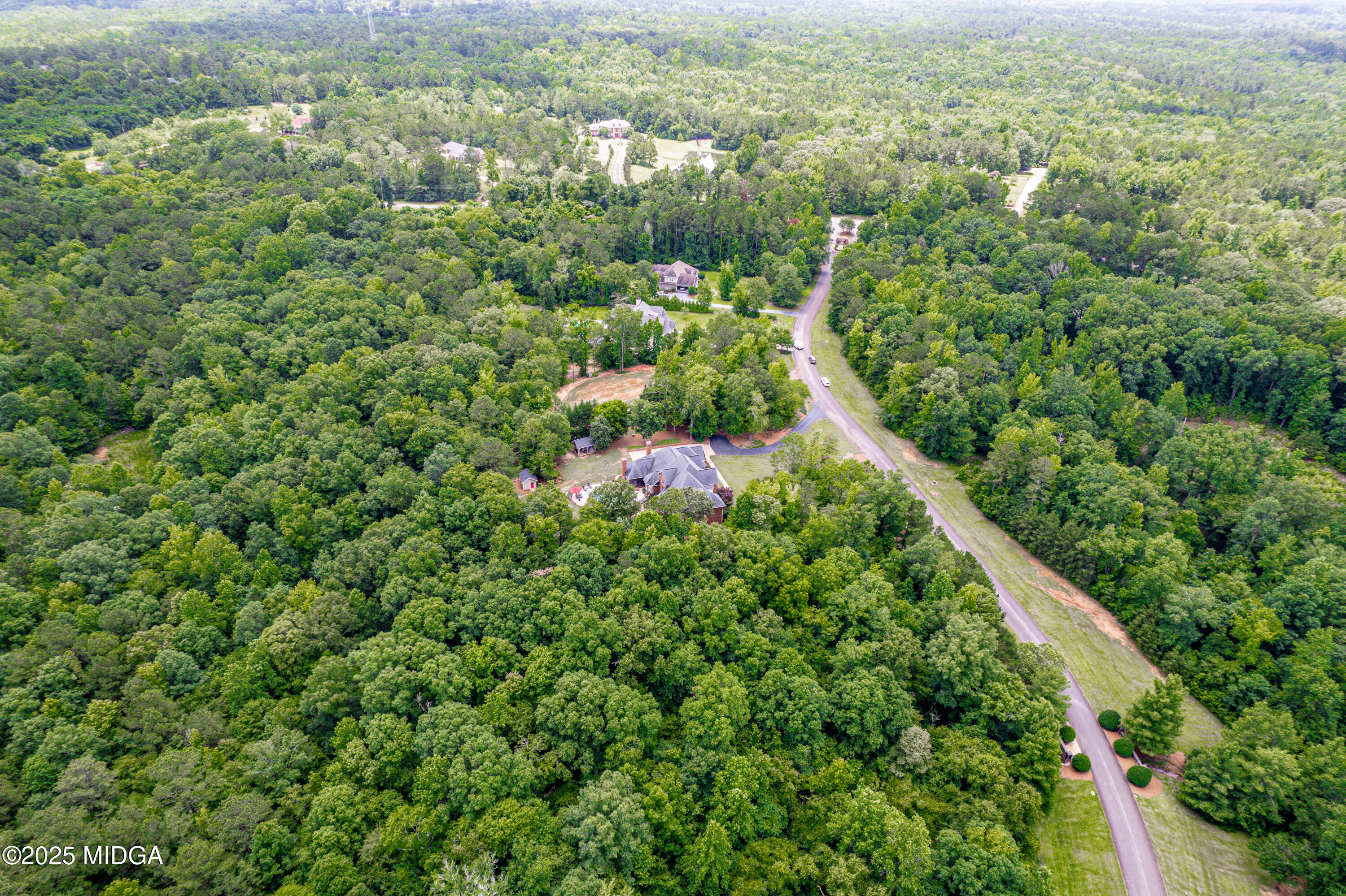 415 Irongate Macon, GA 31220 - Photo 55 of 56 an aerial view of residential houses with outdoor space and trees