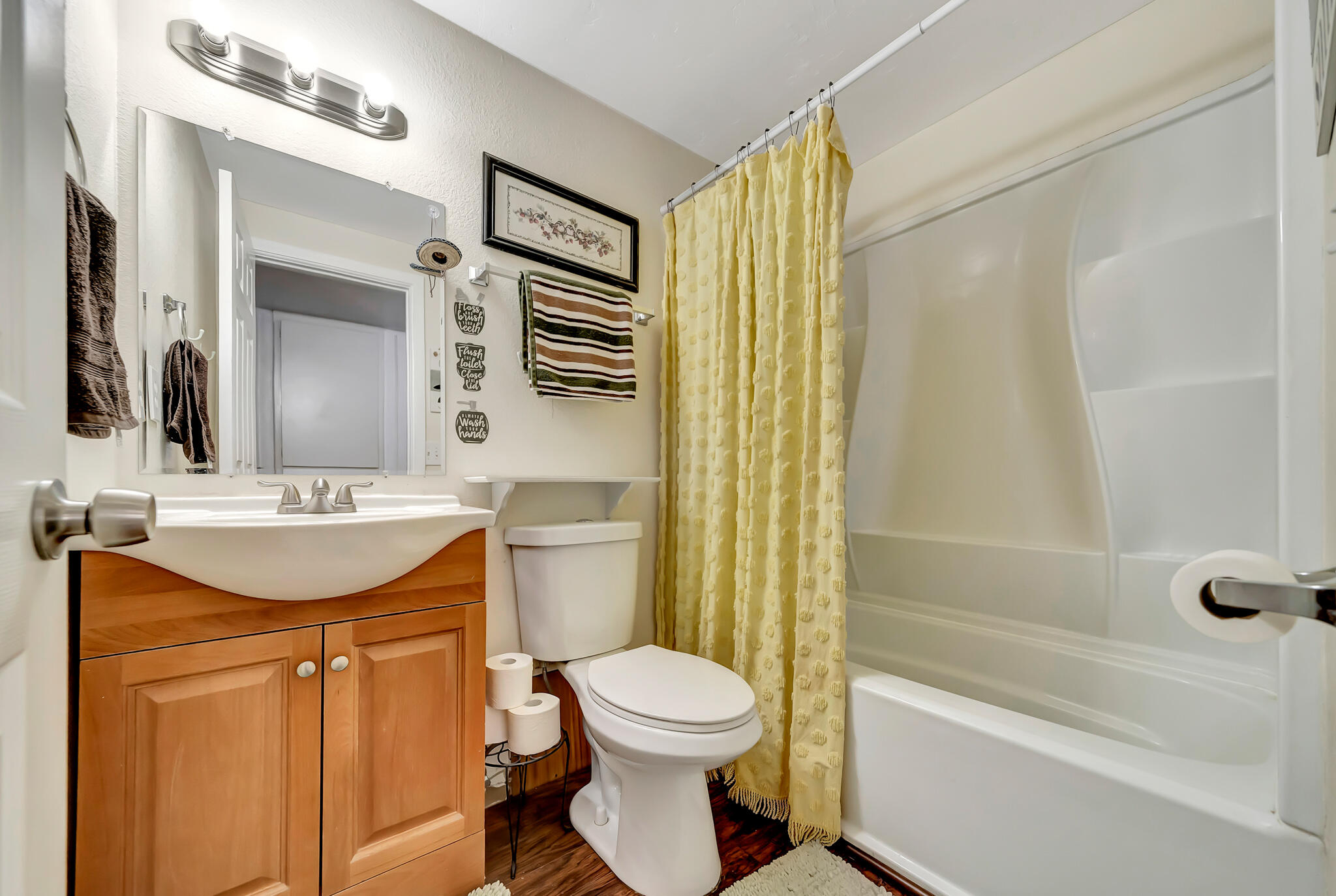 209 North Sunland Drive Ridgecrest, CA 93555 - Photo 17 of 51 a bathroom with a granite countertop sink toilet and shower