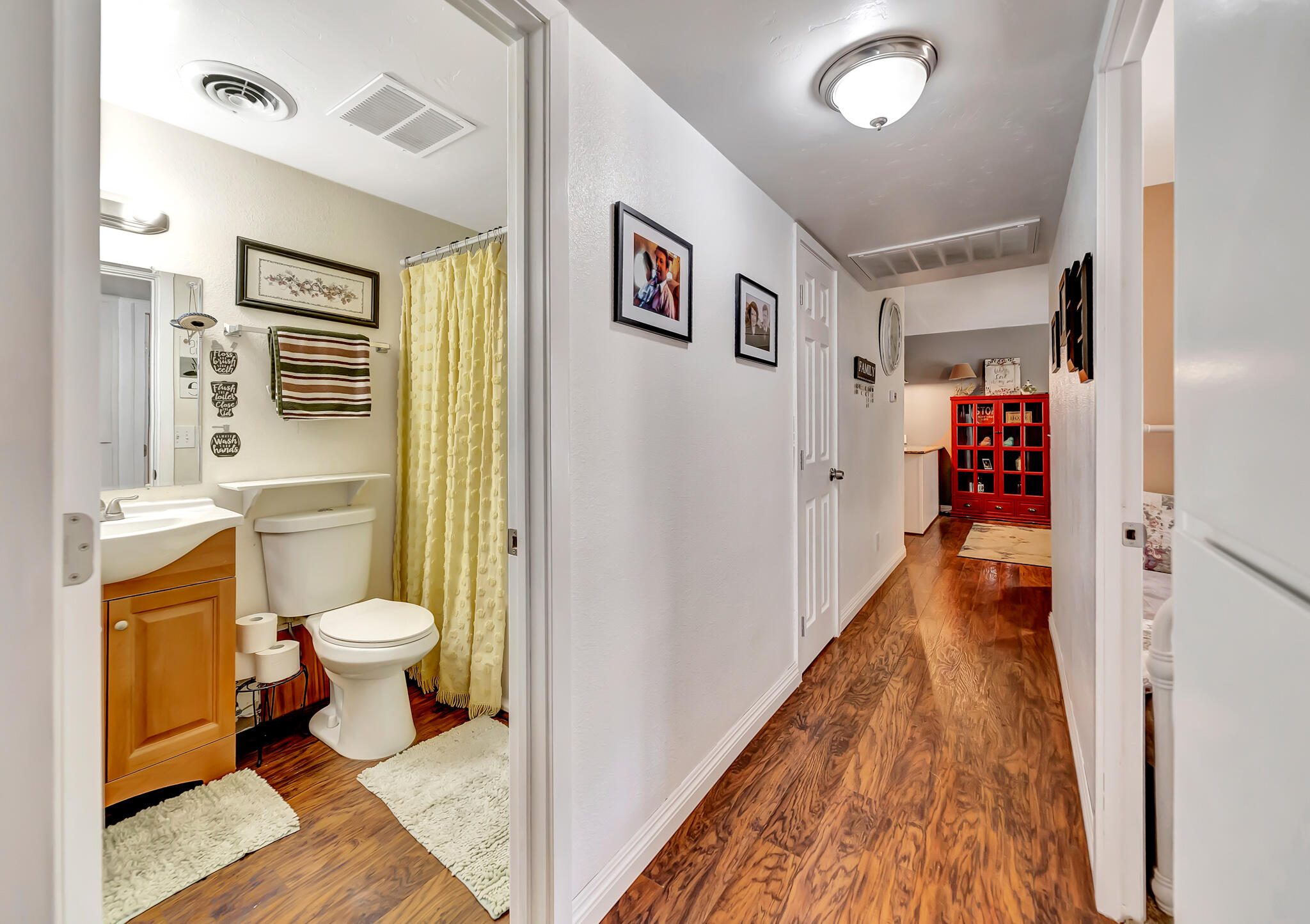 209 North Sunland Drive Ridgecrest, CA 93555 - Photo 21 of 51 a bathroom with a sink and a toilet