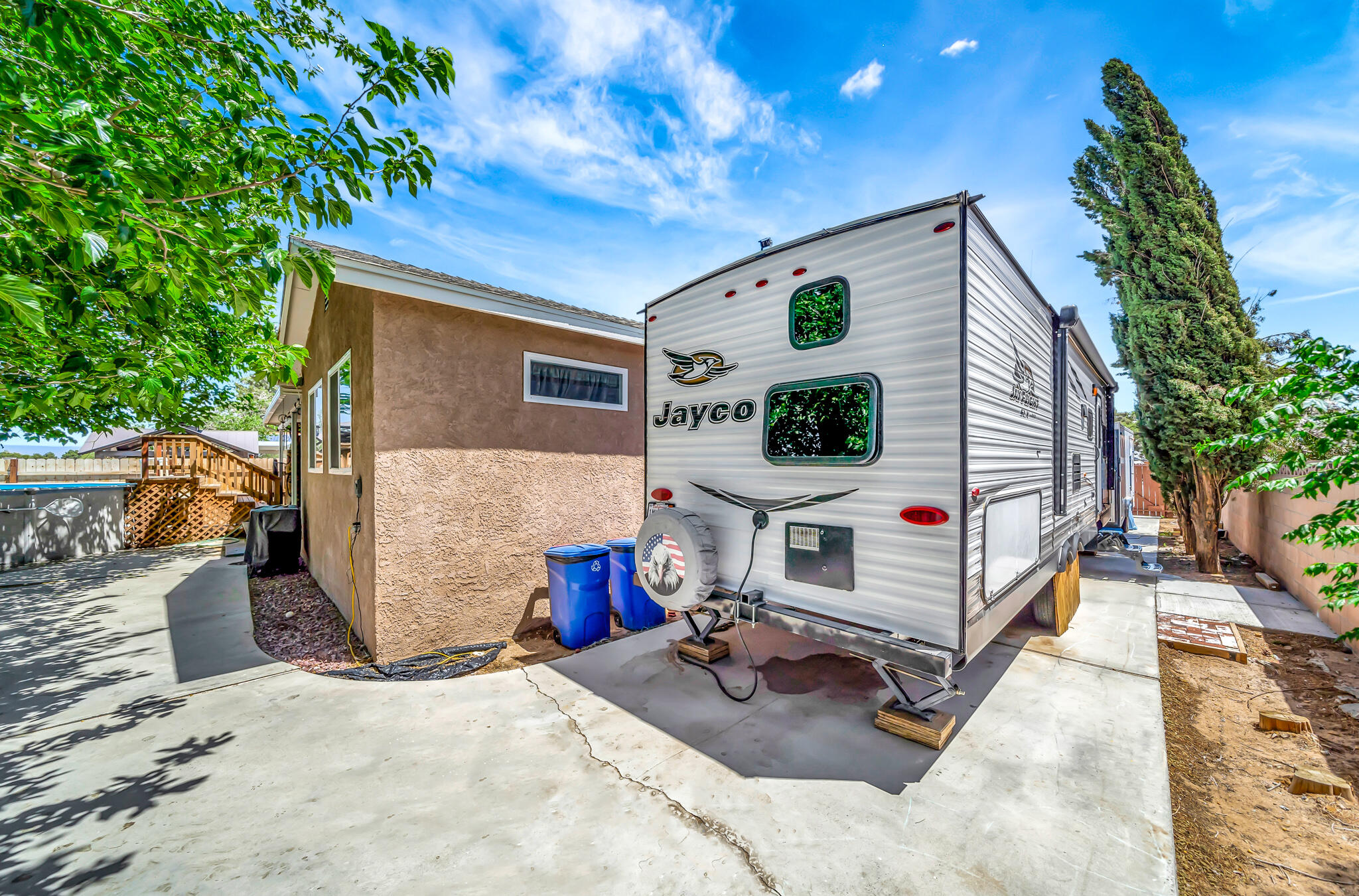 209 North Sunland Drive Ridgecrest, CA 93555 - Photo 38 of 51 a view of a house with a backyard