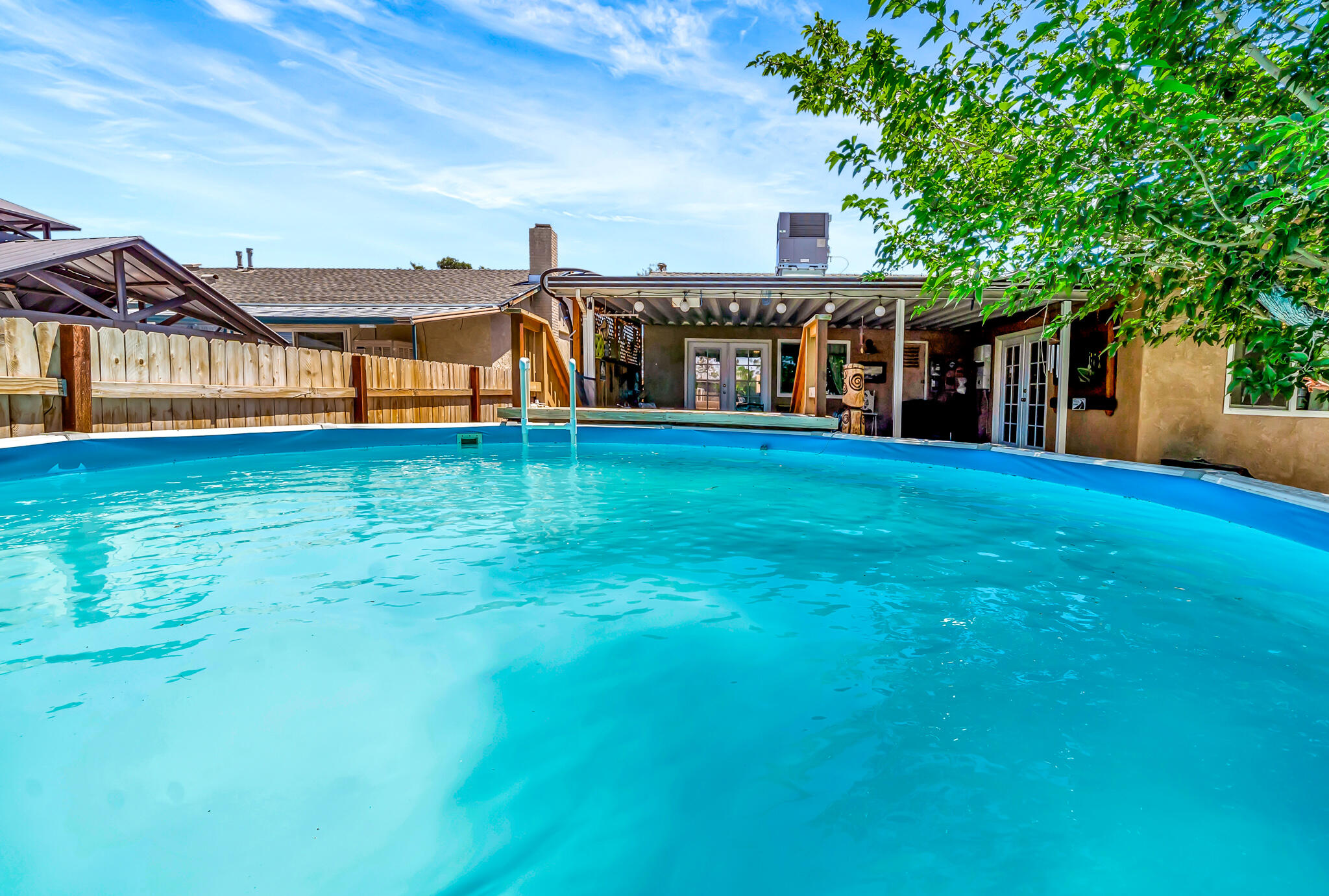 209 North Sunland Drive Ridgecrest, CA 93555 - Photo 44 of 51 a front view of a house with a yard