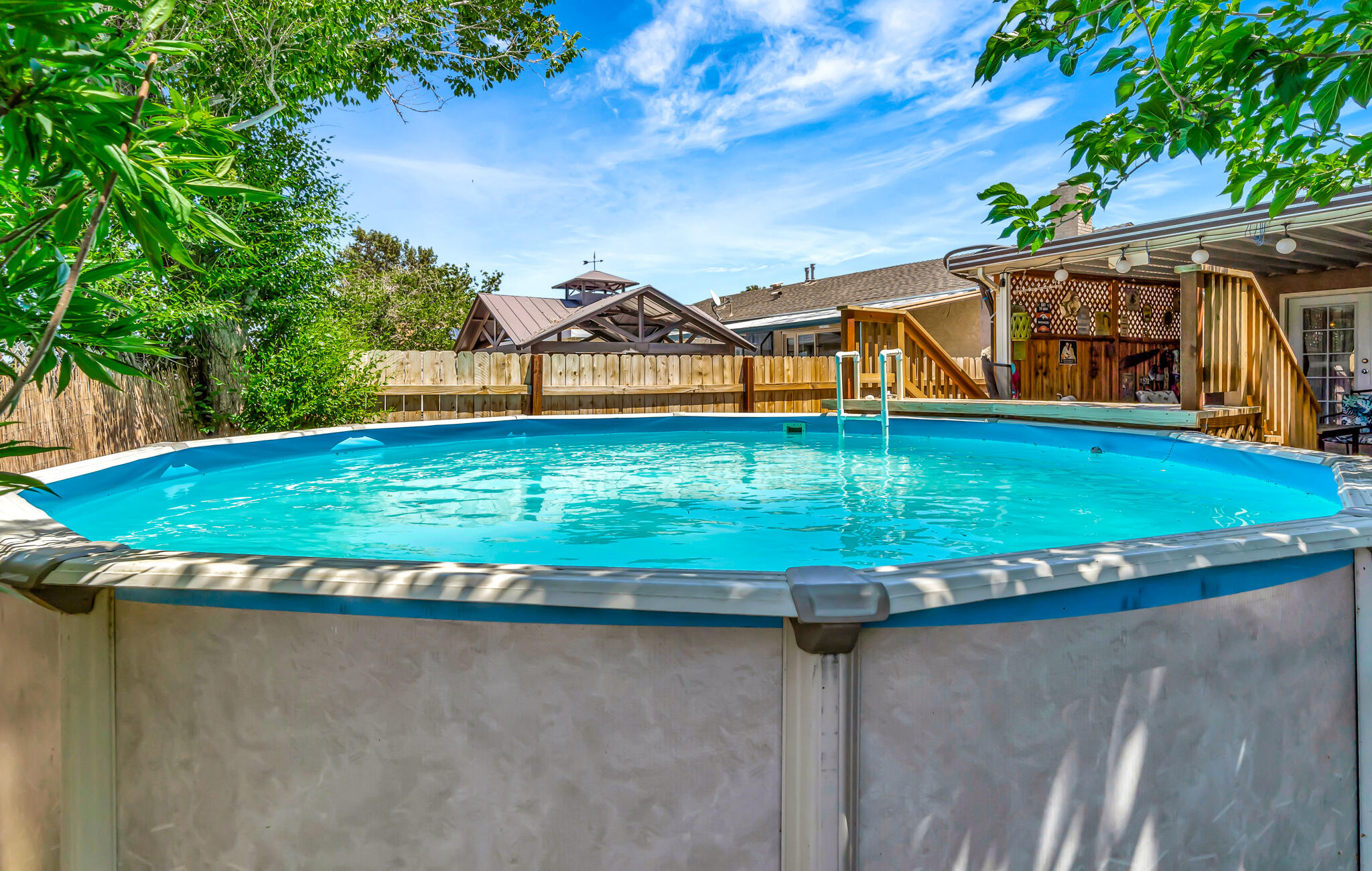 209 North Sunland Drive Ridgecrest, CA 93555 - Photo 45 of 51 a view of a house with a yard