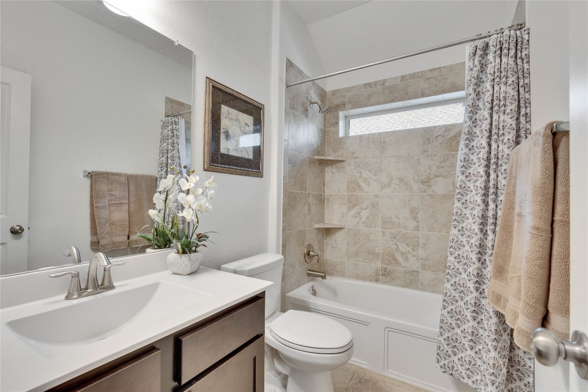 1312 Terrace View Drive Georgetown, TX 78628 - Photo 11 of 40 a bathroom with a sink toilet and shower