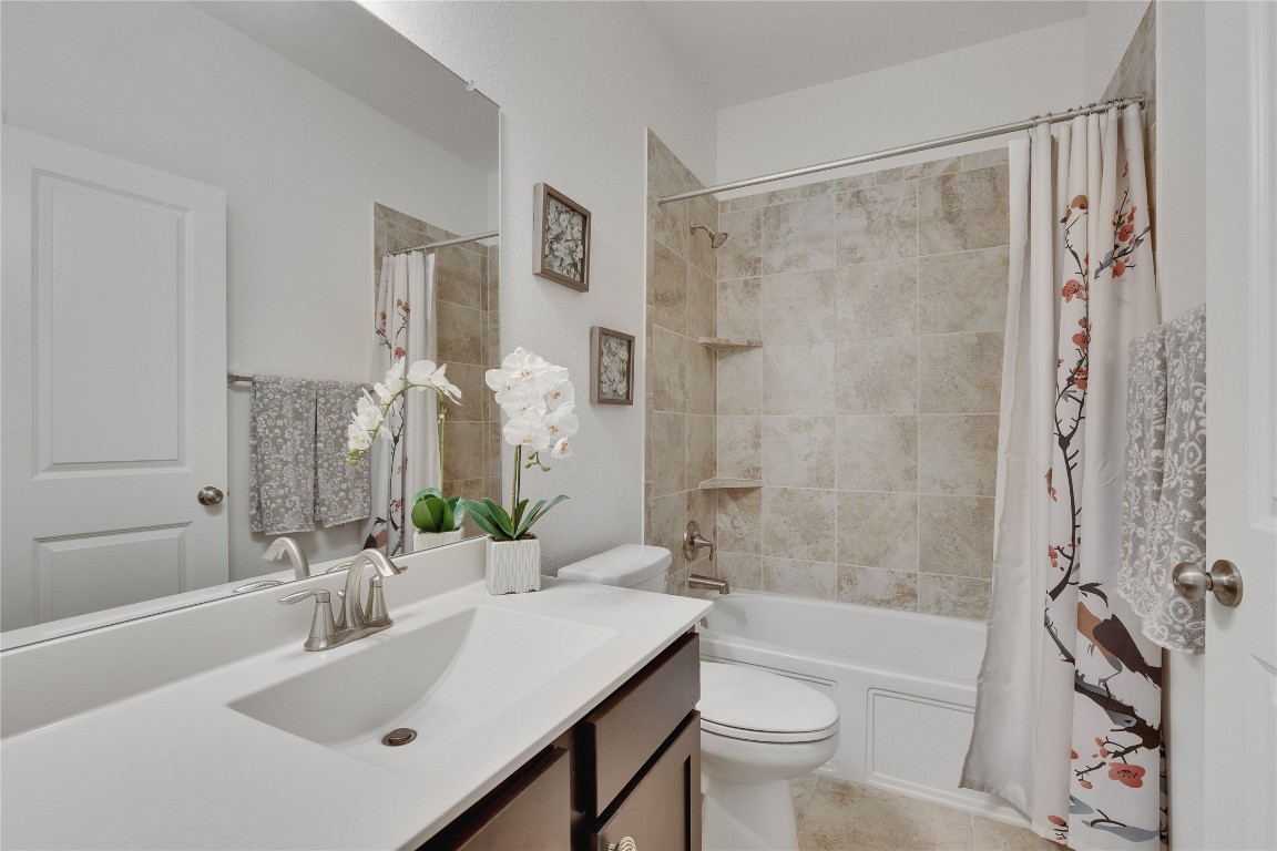 1312 Terrace View Drive Georgetown, TX 78628 - Photo 13 of 40 a bathroom with a sink toilet tub and shower