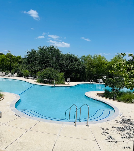 1312 Terrace View Drive Georgetown, TX 78628 - Photo 16 of 40 a view of a swimming pool with a yard