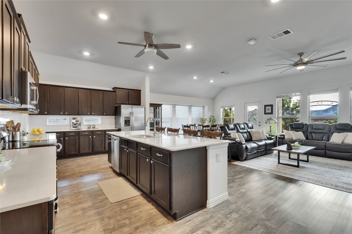 1312 Terrace View Drive Georgetown, TX 78628 - Photo 40 of 40 a kitchen with lots of counter top space a sink appliances and cabinets