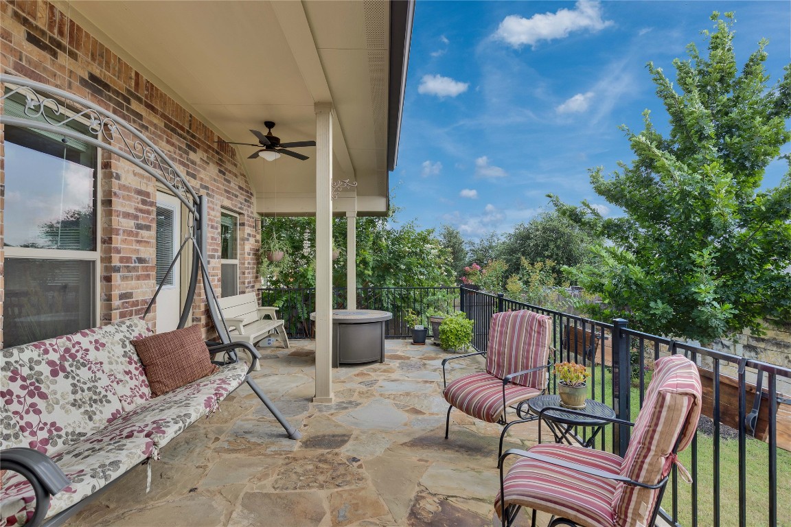 1312 Terrace View Drive Georgetown, TX 78628 - Photo 25 of 40 a view of a patio with couches table and chairs and potted plants