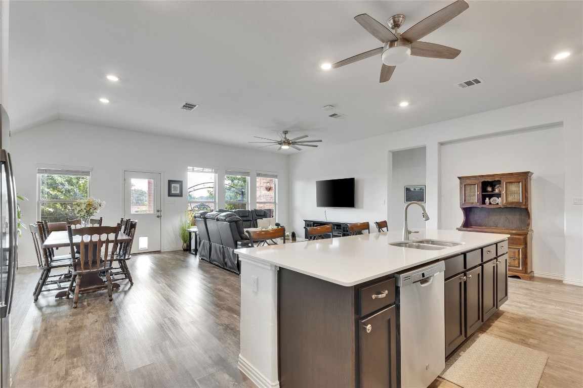 1312 Terrace View Drive Georgetown, TX 78628 - Photo 32 of 40 a room with a table chairs and a open kitchen view