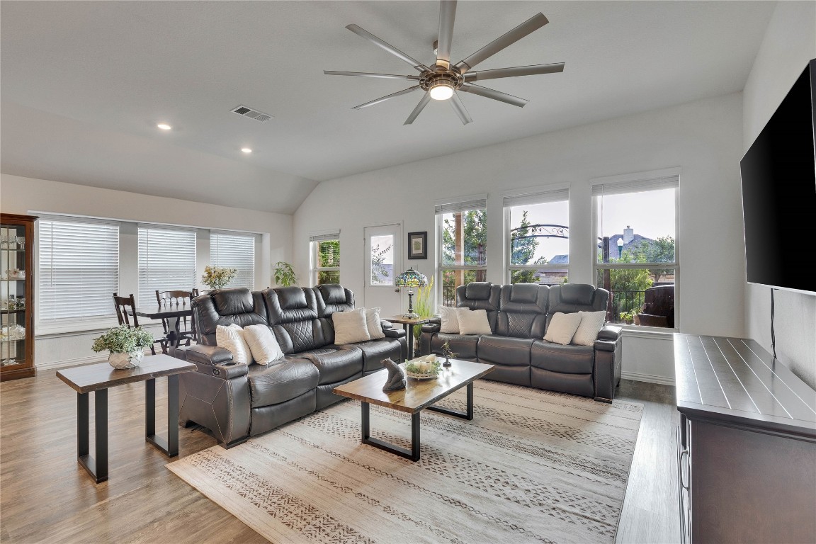 1312 Terrace View Drive Georgetown, TX 78628 - Photo 33 of 40 Living room with lofted ceiling, light wood-type flooring, ceiling fan, and recessed lighting