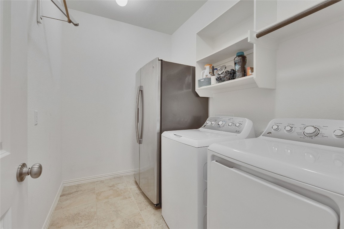 1312 Terrace View Drive Georgetown, TX 78628 - Photo 36 of 40 a view of bathroom with a washer and dryer