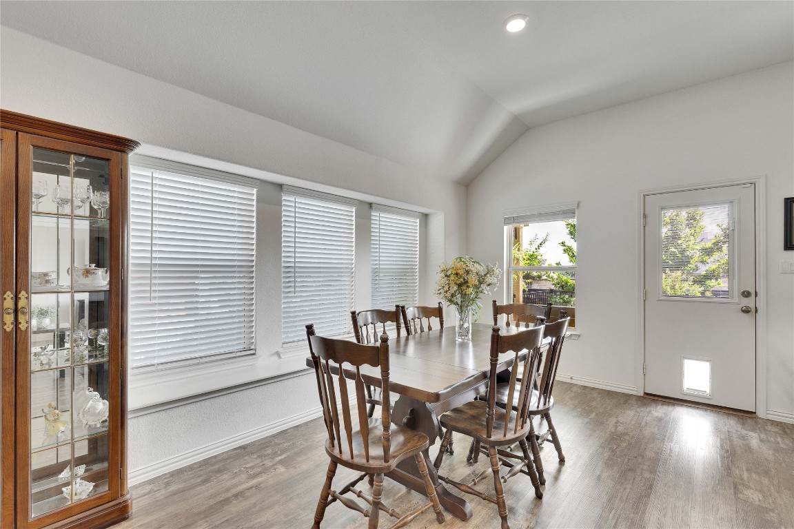 1312 Terrace View Drive Georgetown, TX 78628 - Photo 4 of 40 a view of a dining room with furniture and wooden floor