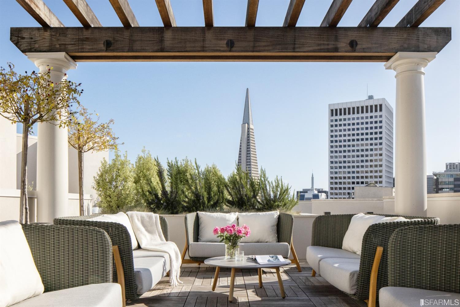 Celebrating its Nob Hill locale, The Sky Line is a roof terrace designed for al fresco entertaining with an outdoor kitchen that includes a gas grill, a double-sided fireplace, and a dining area.