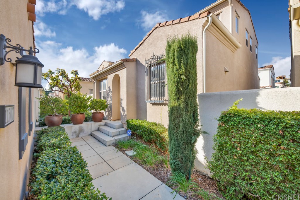 a view of a back yard of the house