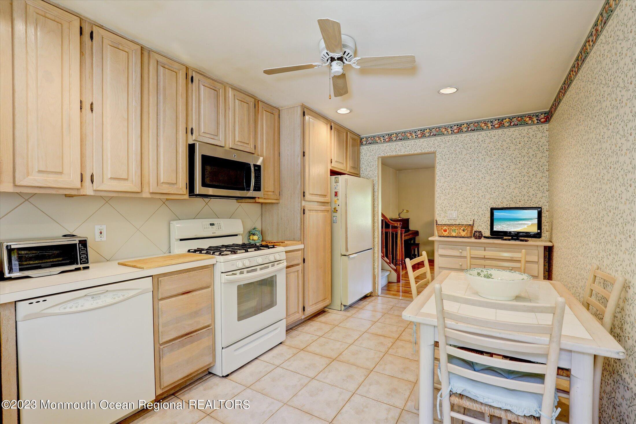 5 Ramble Way Hazlet, NJ 07730 - Photo 17 of 34 a kitchen with appliances a sink and cabinets