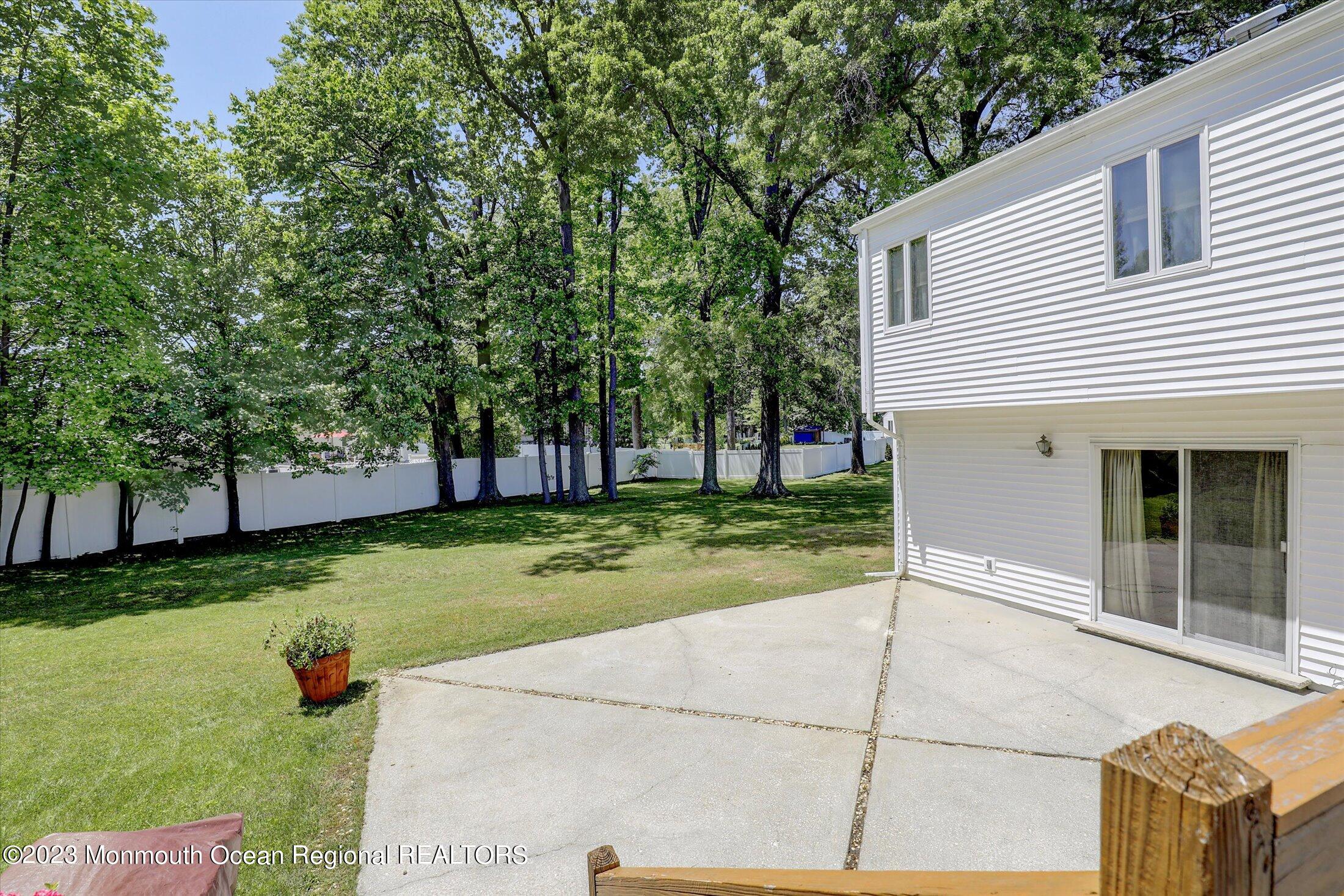 5 Ramble Way Hazlet, NJ 07730 - Photo 26 of 34 a view of a porch with a yard