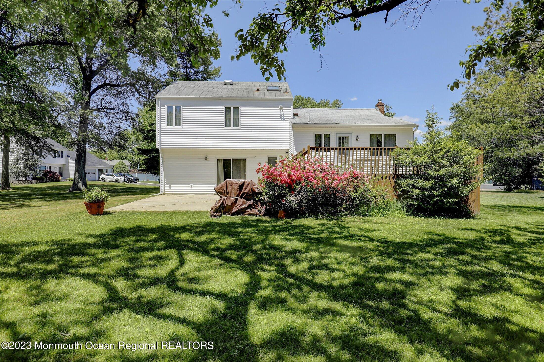 5 Ramble Way Hazlet, NJ 07730 - Photo 27 of 34 a front view of house with yard and trees
