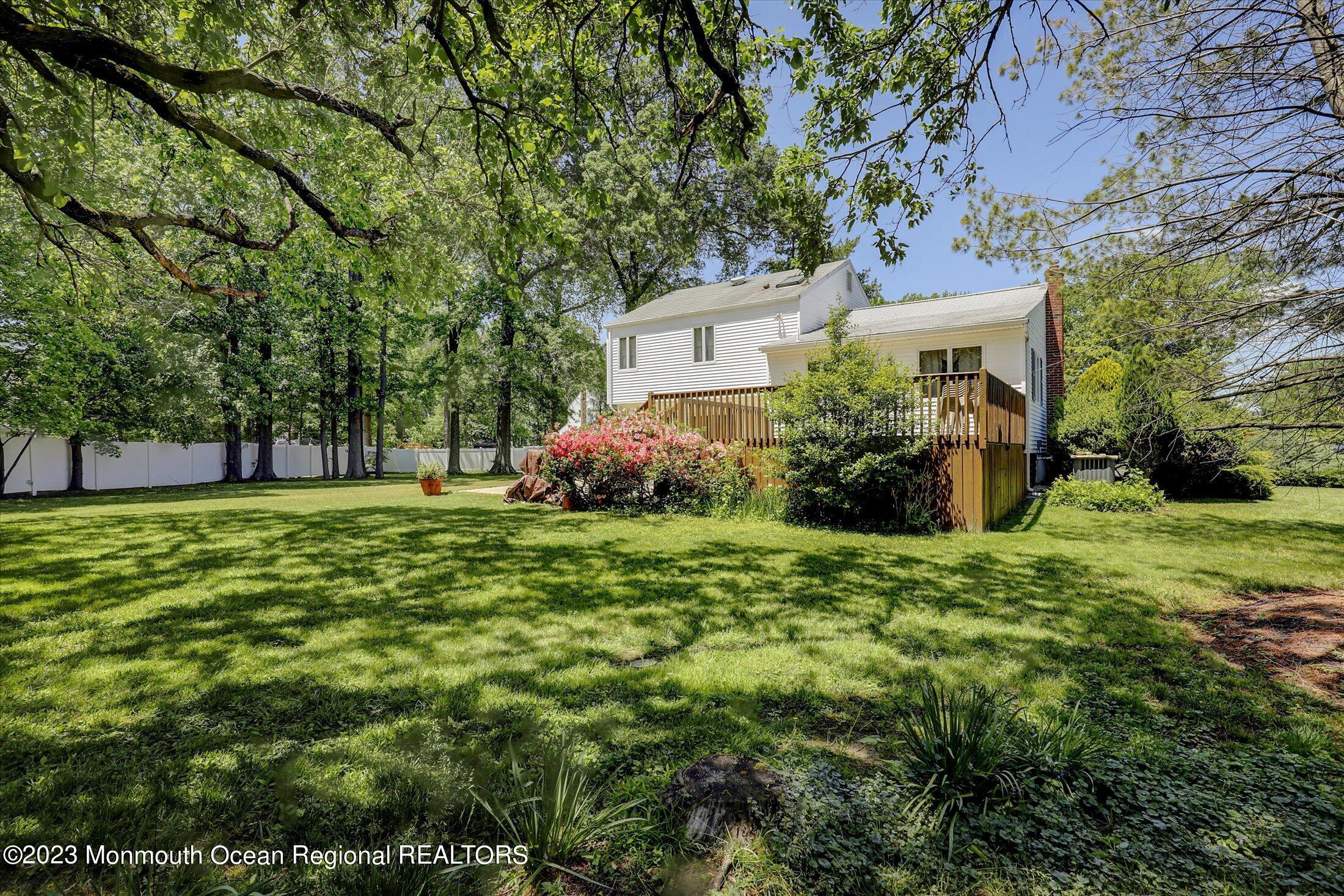 5 Ramble Way Hazlet, NJ 07730 - Photo 28 of 34 a view of a house with a yard