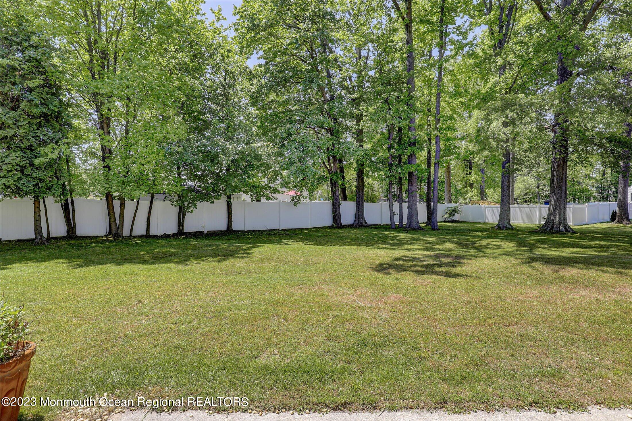 5 Ramble Way Hazlet, NJ 07730 - Photo 29 of 34 a view of a yard with a house