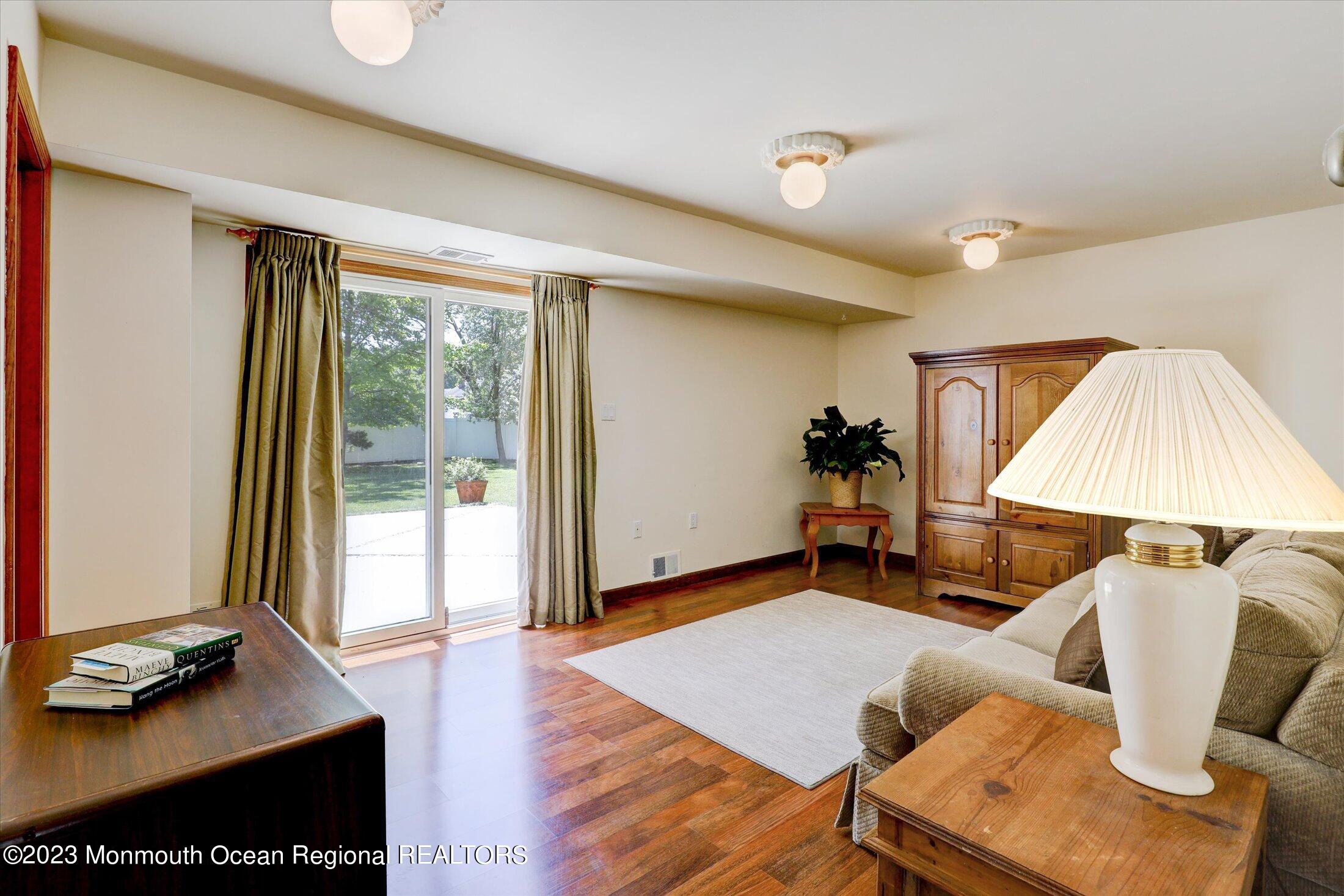 5 Ramble Way Hazlet, NJ 07730 - Photo 5 of 34 a living room with furniture and a window