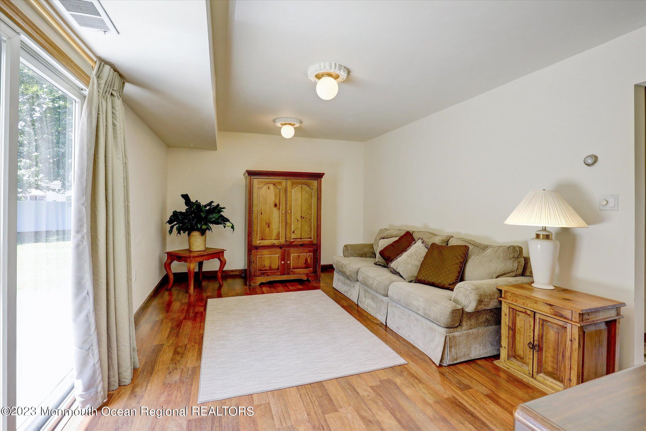 5 Ramble Way Hazlet, NJ 07730 - Photo 6 of 34 a living room with furniture and a window