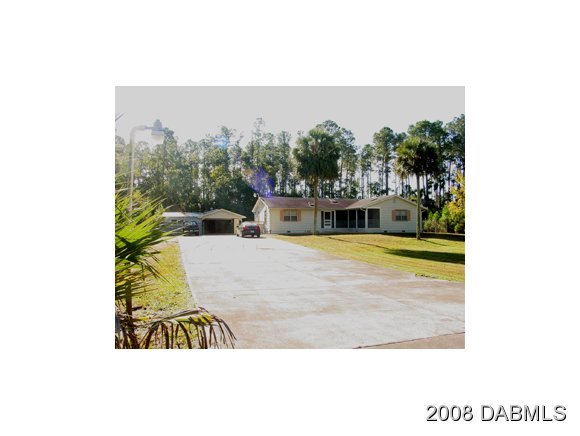 3505 Old Deland Road Daytona Beach, FL 32124 - Photo 1 of 10 a view of a swimming pool with outdoor space