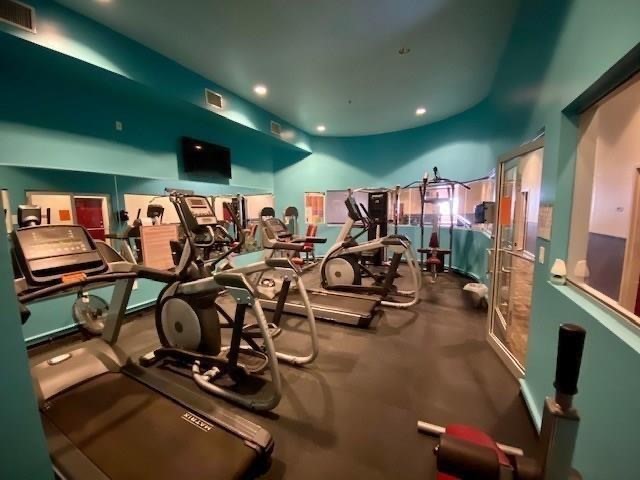 3311 Yupon Street, Unit 605 Houston, TX 77006 - Photo 15 of 16 Gym weights and treadmill/elliptical
