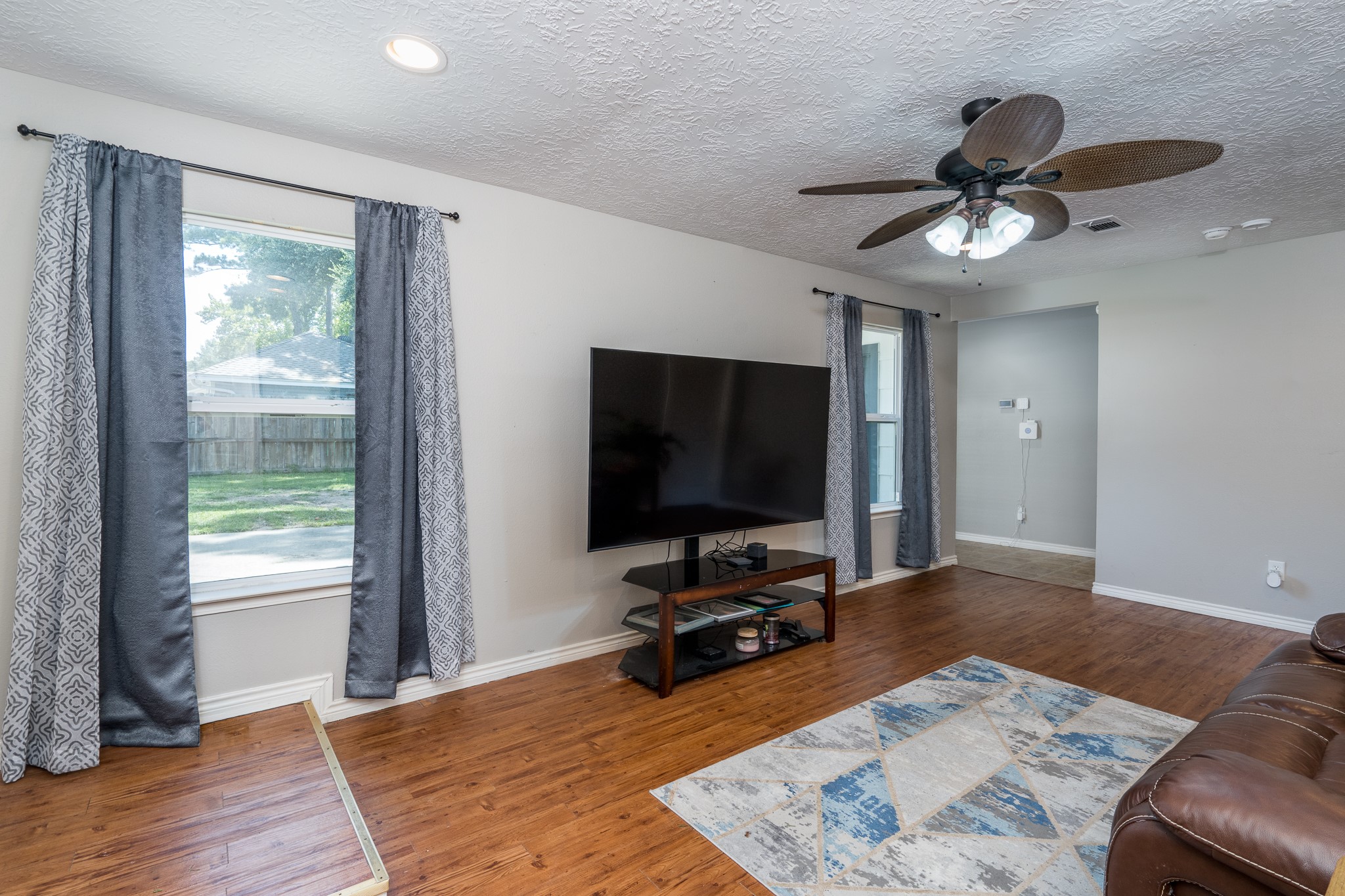 6527 Castle Pine Lane Spring, TX 77379 - Photo 38 of 47 With its own inviting living area and direct access to the patio through elegant French double doors, this thoughtfully designed space is both functional and welcoming.