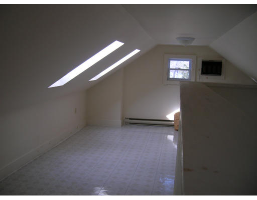 4 Margaret Road Newton, MA 02461 - Photo 10 of 10 a view of an empty room with a window