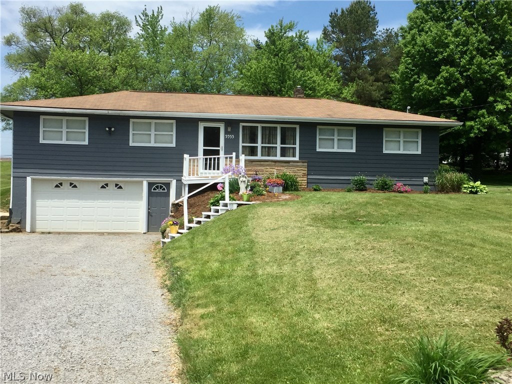 5955 Wynnbrook Road Southwest Canton, OH 44706 - Photo 1 of 26 Front exterior nicely landscaped with newer roof, doors and freshly painted