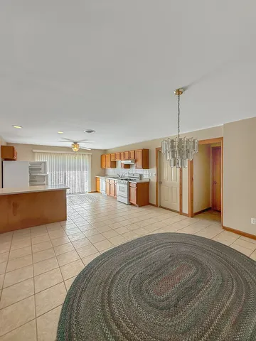 a view of a kitchen with a sink