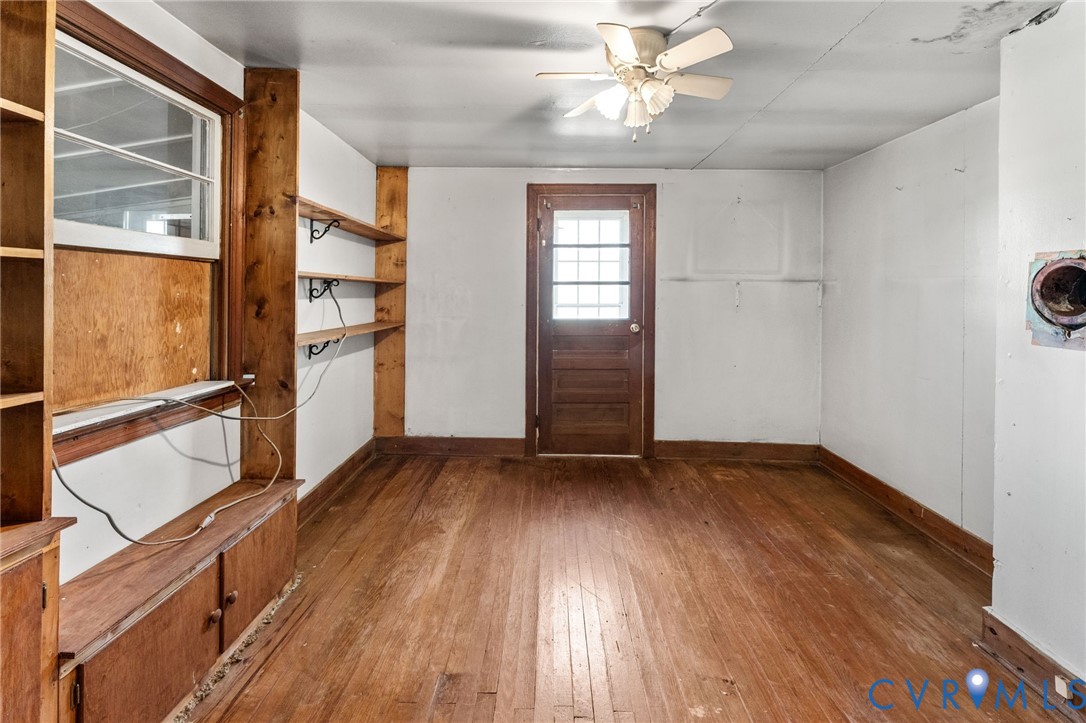 19161 Hollowing Creek Road Beaverdam, VA 23015 - Photo 20 of 27 wooden floor in an empty room with a window