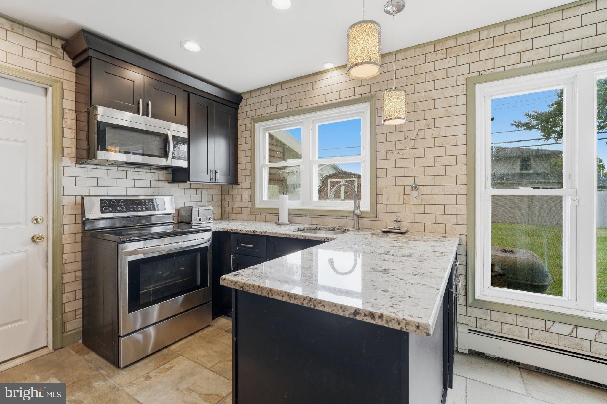 94 Terrace Road Levittown, PA 19056 - Photo 18 of 70 Modern kitchen with stylish finishes.