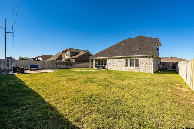a house view with a swimming pool