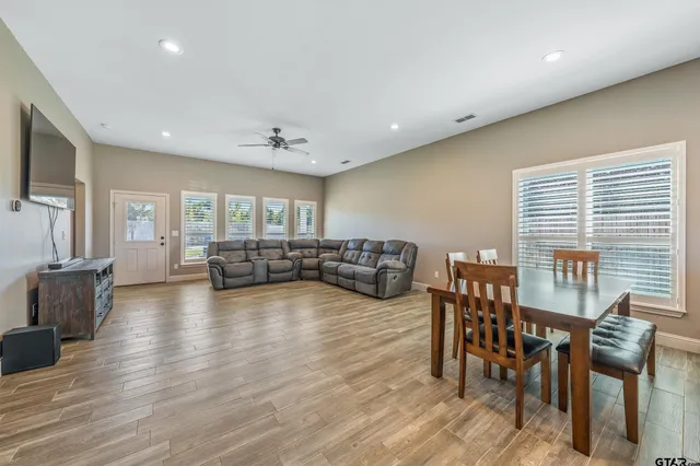a living room with furniture and a table