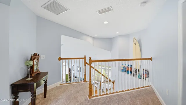 a bathroom with a bathtub and a window