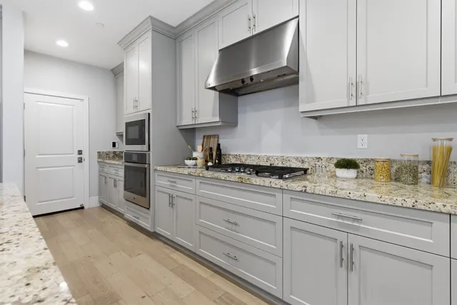 a view of a dining room with furniture and window