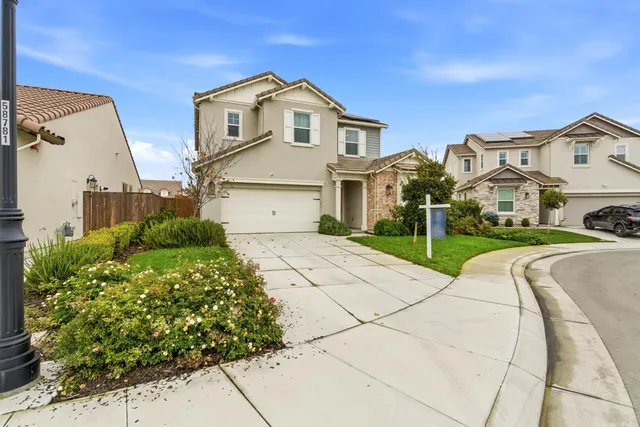 an aerial view of a highlighted house