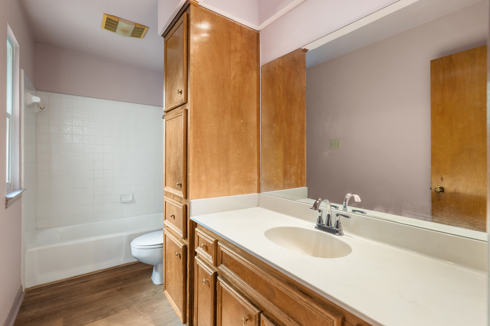 3845 Ranch Road 2222, Unit 19 Austin, TX 78731 - Photo 23 of 38 a bathroom with a granite countertop sink toilet and shower