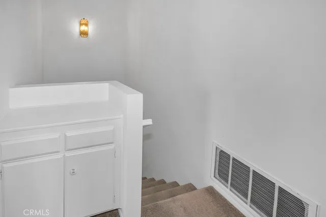 a view of an empty walk in closet