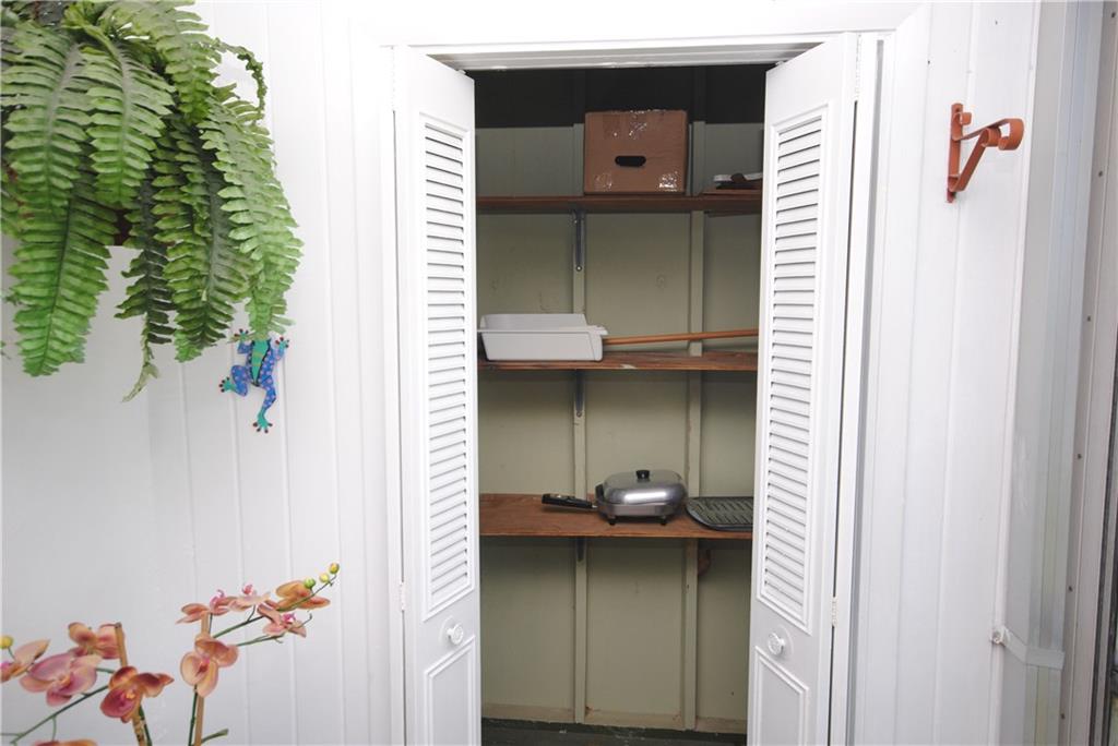 1997 Southwest Palm City Road, Unit I Stuart, FL 34994 - Photo 21 of 36 Balcony Storage Room