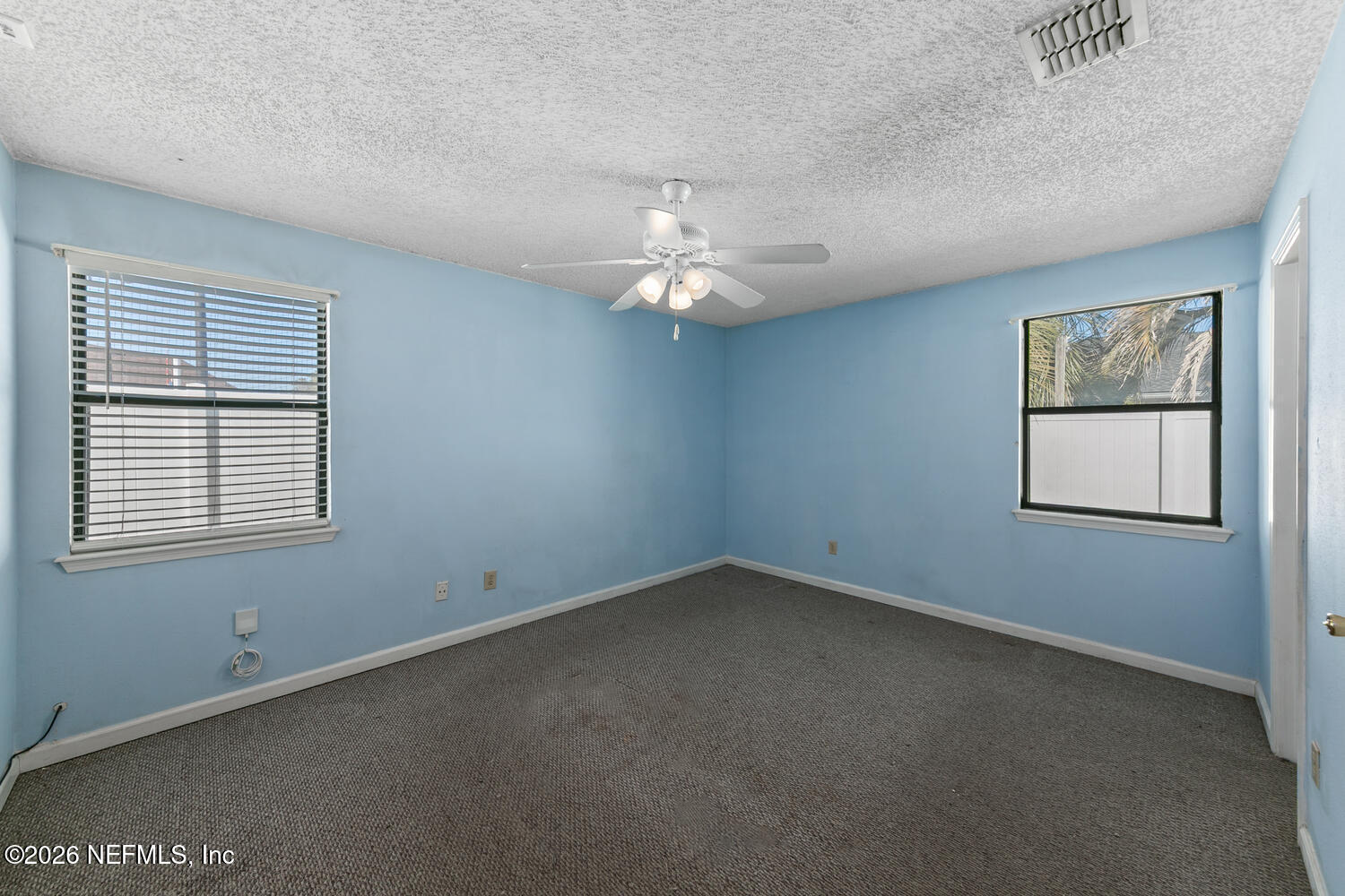 494 Filmore Drive Jacksonville, FL 32225 - Photo 12 of 25 an empty room with a window
