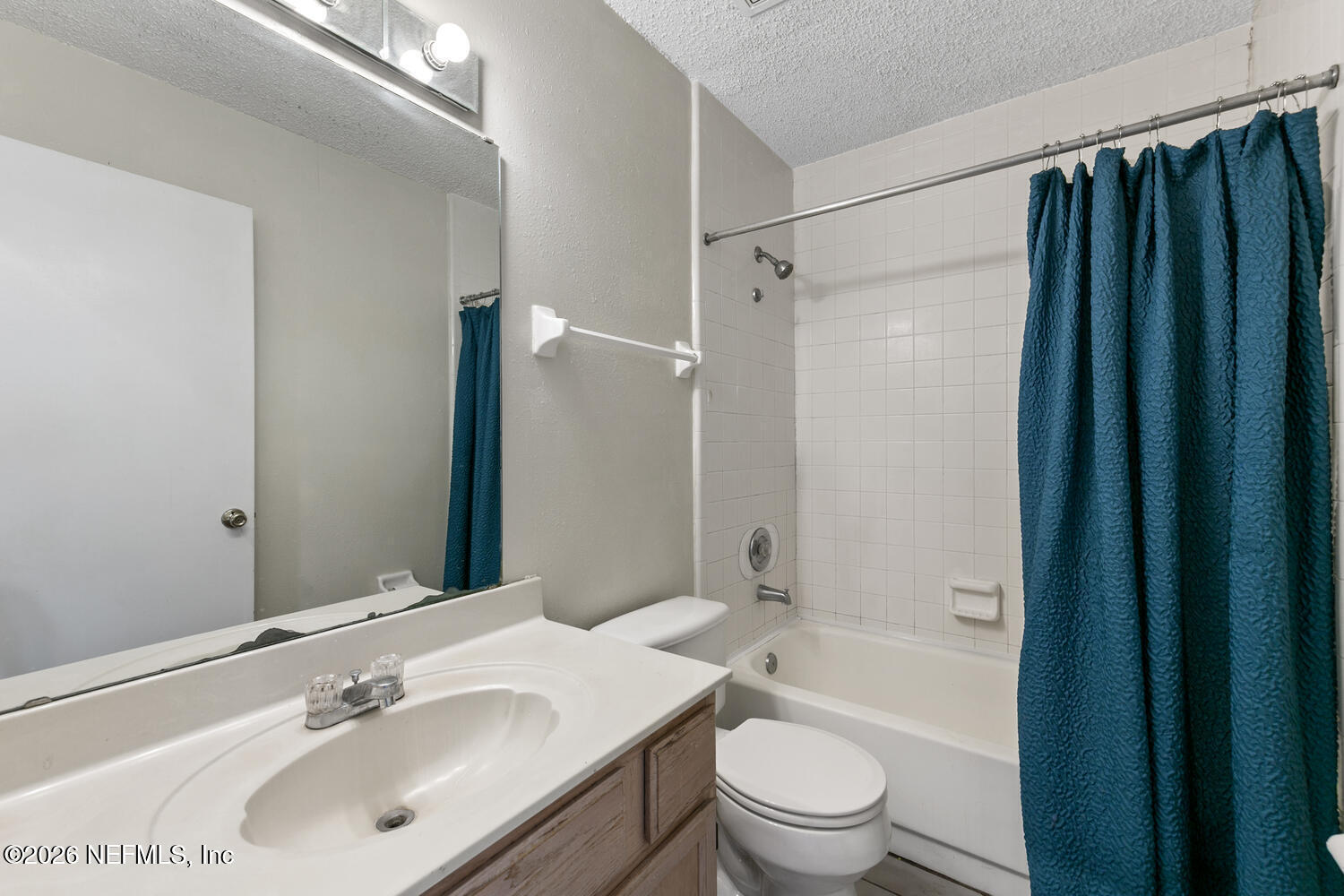 494 Filmore Drive Jacksonville, FL 32225 - Photo 19 of 25 a bathroom with a sink a toilet and shower