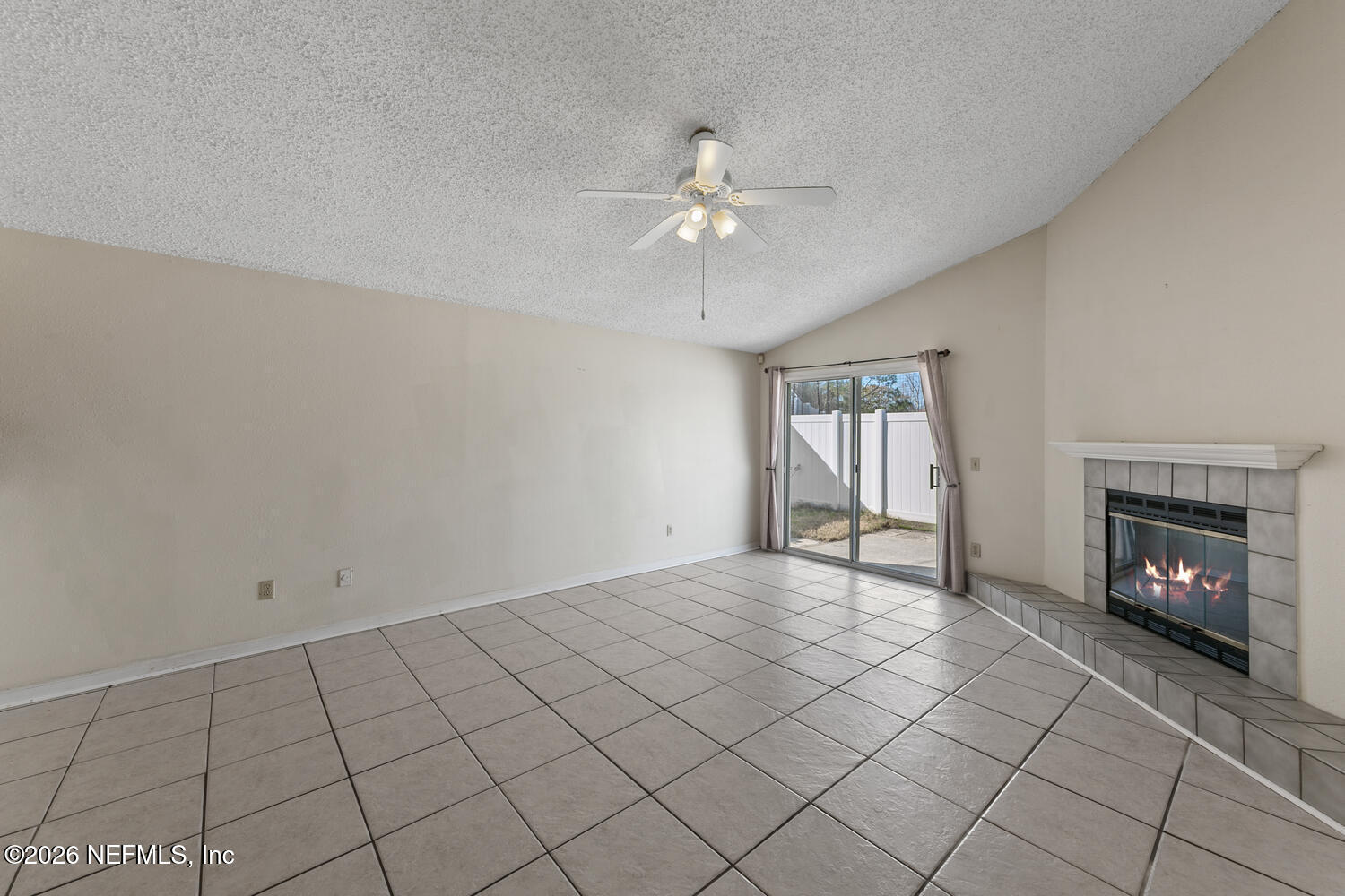 494 Filmore Drive Jacksonville, FL 32225 - Photo 9 of 25 a view of an empty room window and fire place