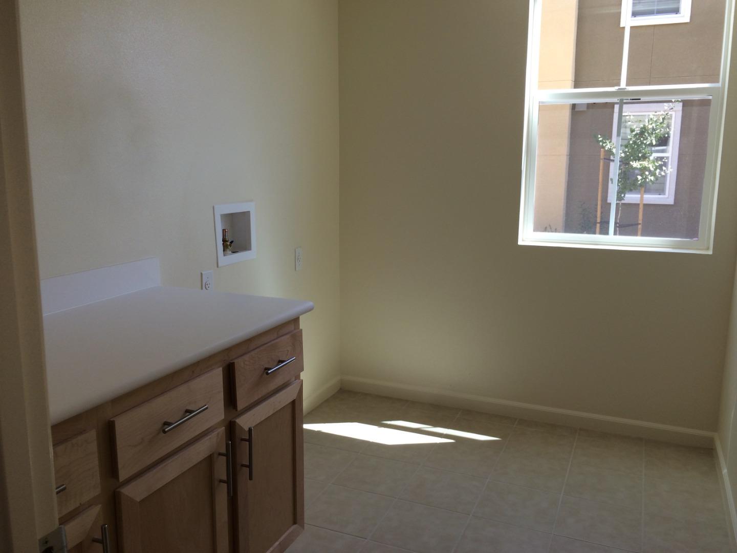 695 Elderberry Drive Milpitas, CA 95035 - Photo 11 of 22 a view of storage and utility room with window