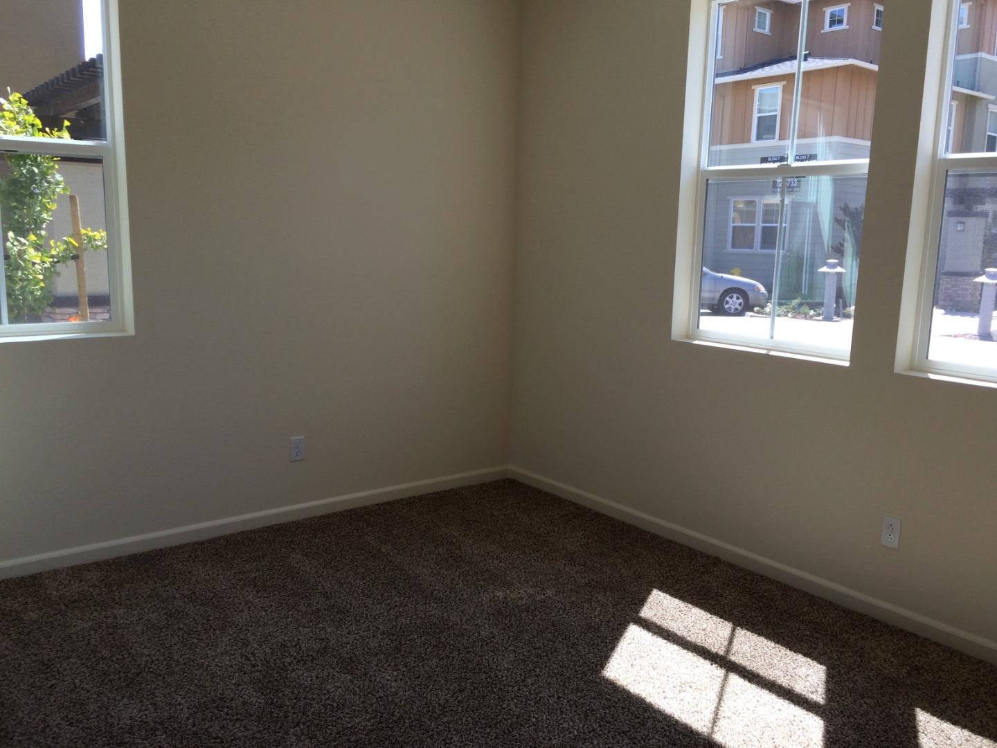 695 Elderberry Drive Milpitas, CA 95035 - Photo 13 of 22 an empty room with a window