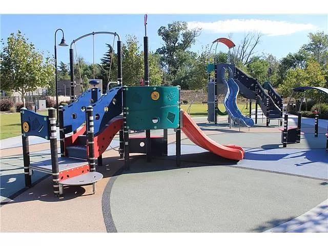 695 Elderberry Drive Milpitas, CA 95035 - Photo 21 of 22 a play room with lots of swings and slides
