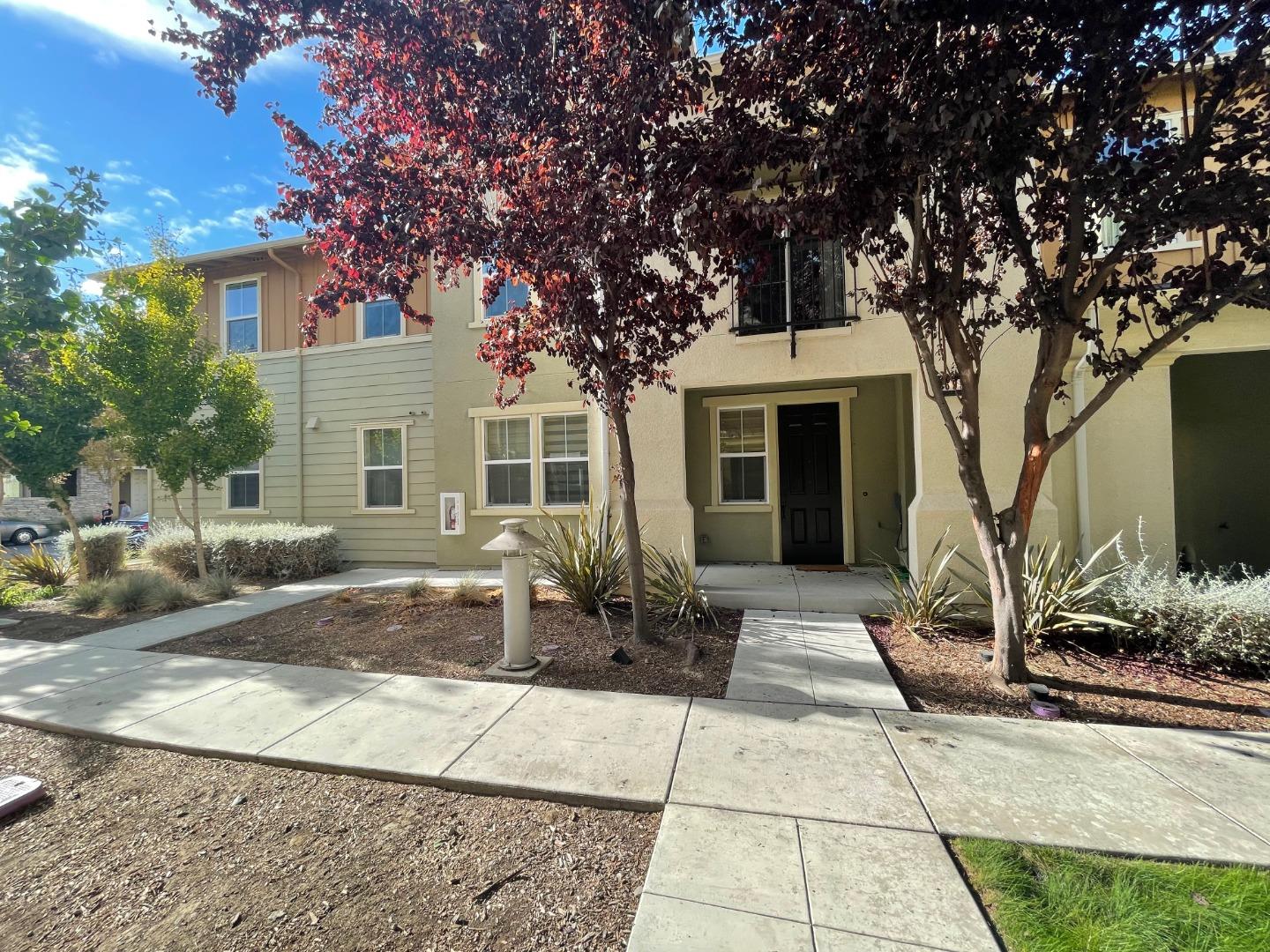 695 Elderberry Drive Milpitas, CA 95035 - Photo 6 of 22 a front view of a house with a tree