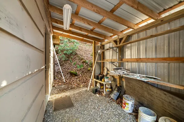 a view of a porch with wooden floor