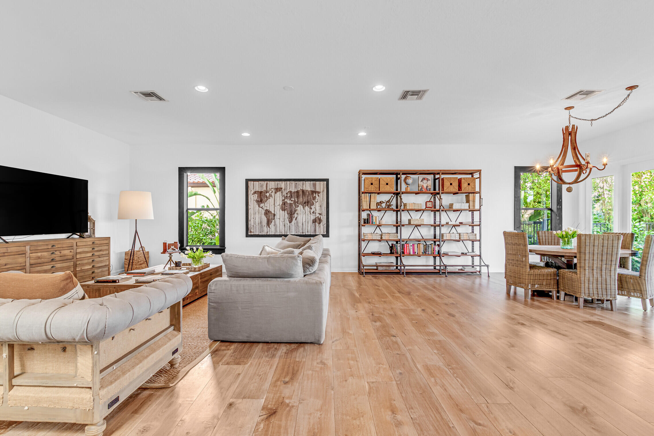 11663 Sunrise View Lane Wellington, FL 33449 - Photo 16 of 43 a living room with furniture and a flat screen tv