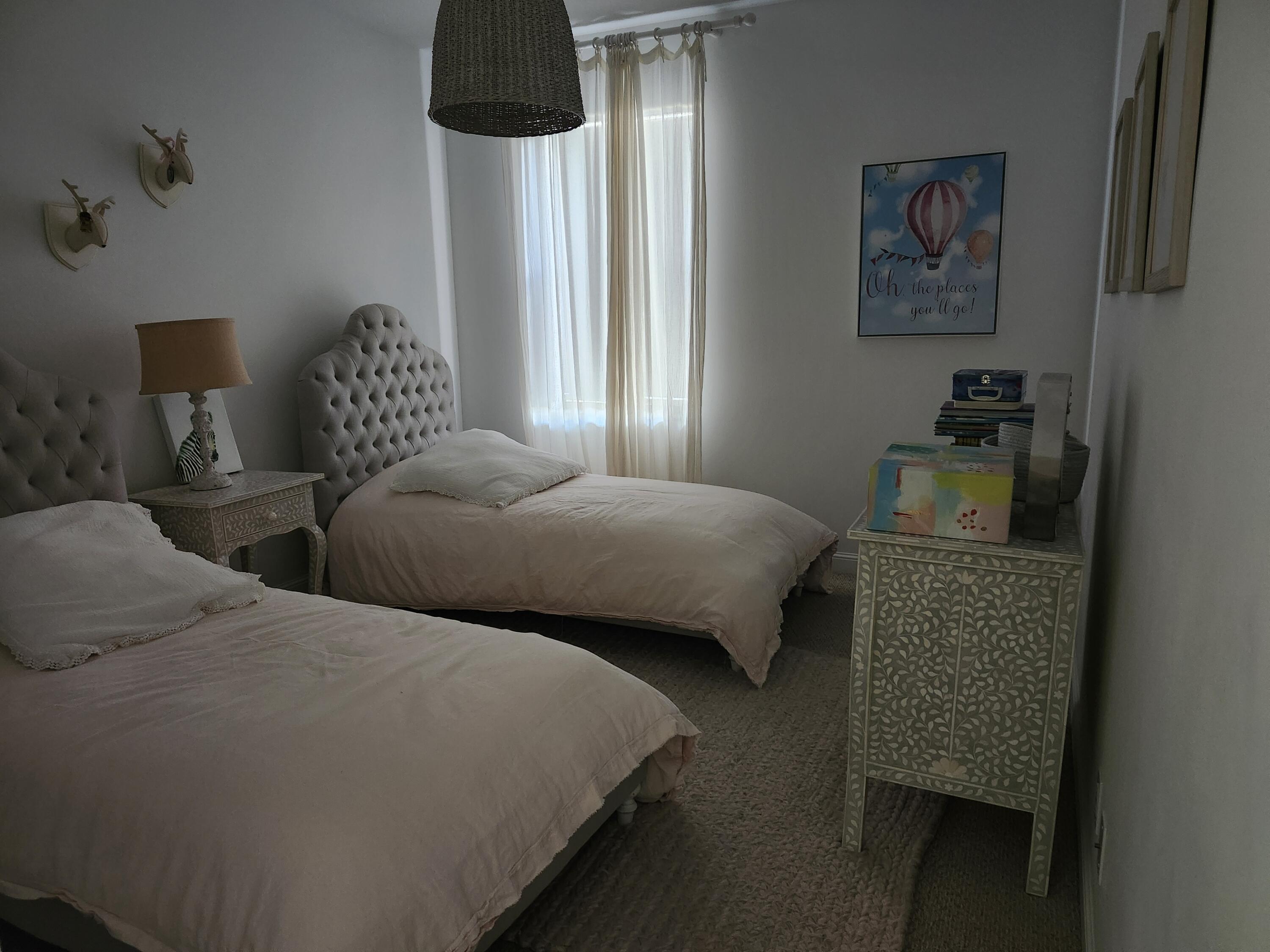 11663 Sunrise View Lane Wellington, FL 33449 - Photo 31 of 43 a bedroom with two beds and painted walls